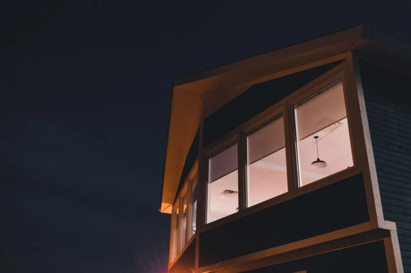 Lit windows of a house at night
