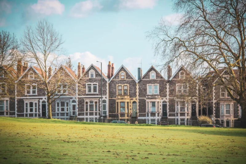 Do blinds improve your EPC rating? A row of Victorian terraced houses beside a park